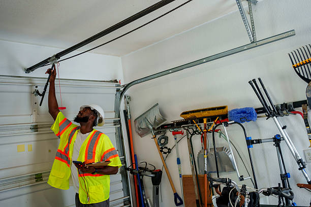 Professional Garage Door technician working in Winfield, KS